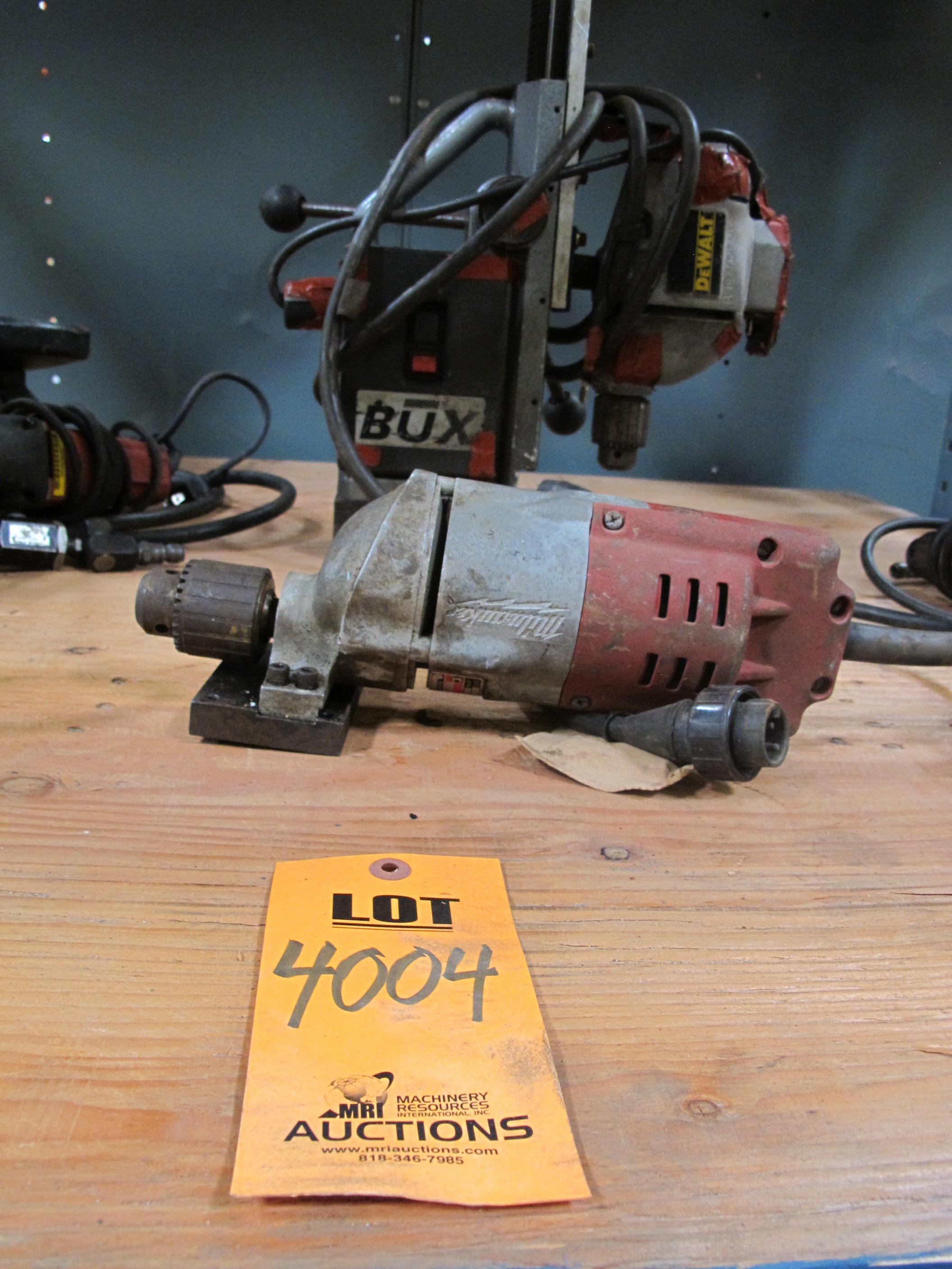LOT TO INCLUDE: (1) MILWAUKEE HEAVY DUTY 1/2 IN DRILL, 600 RPM, 120 V 60 HZ, (1) DRILL PRESS, BUX MODEL DAH1/2NO91035 FUSE 1.6 A, 115 VAC, ATTACHED: DEWALT, DW131 1/2 IN (13 MM) SPADE HANDLE DRILL, 450 RPM. LOADING & HANDLING FEE $5-4004